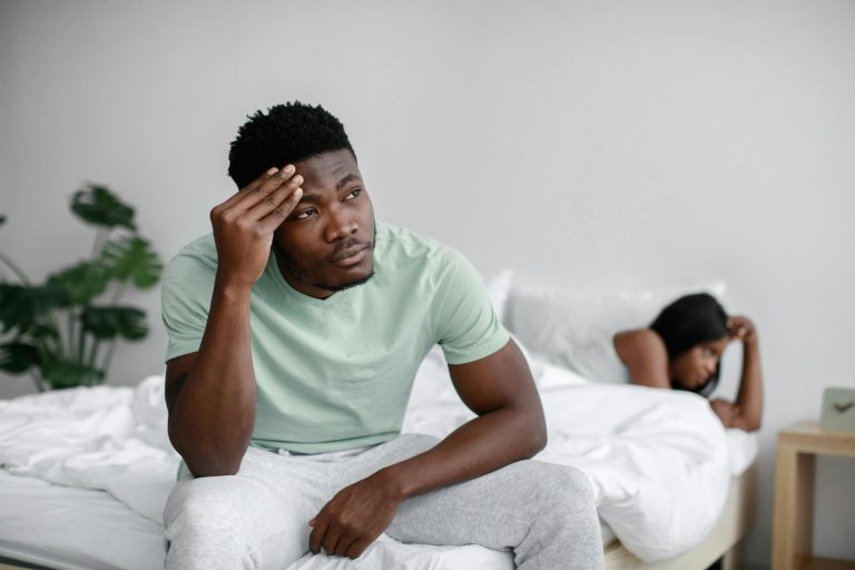 bickering couple on bed