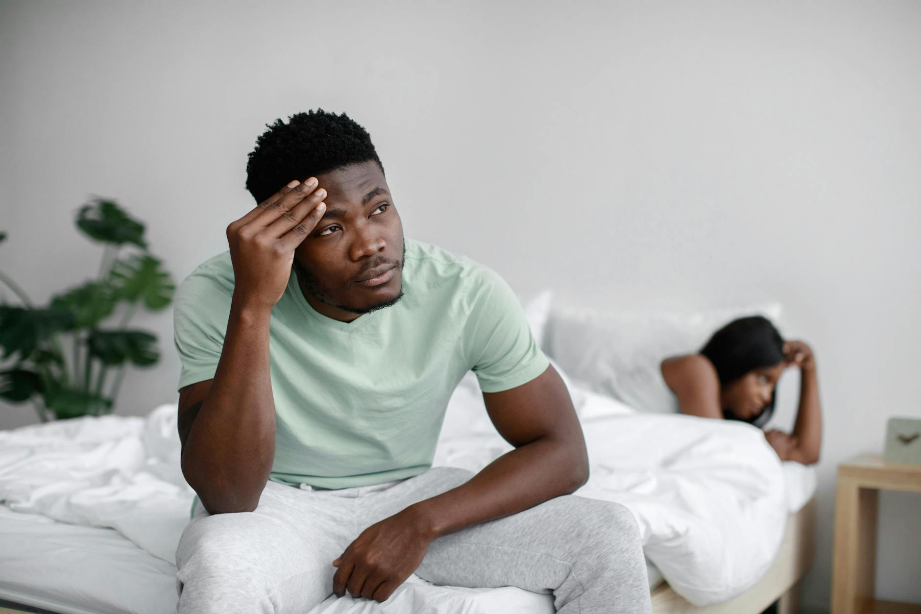 bickering couple on bed