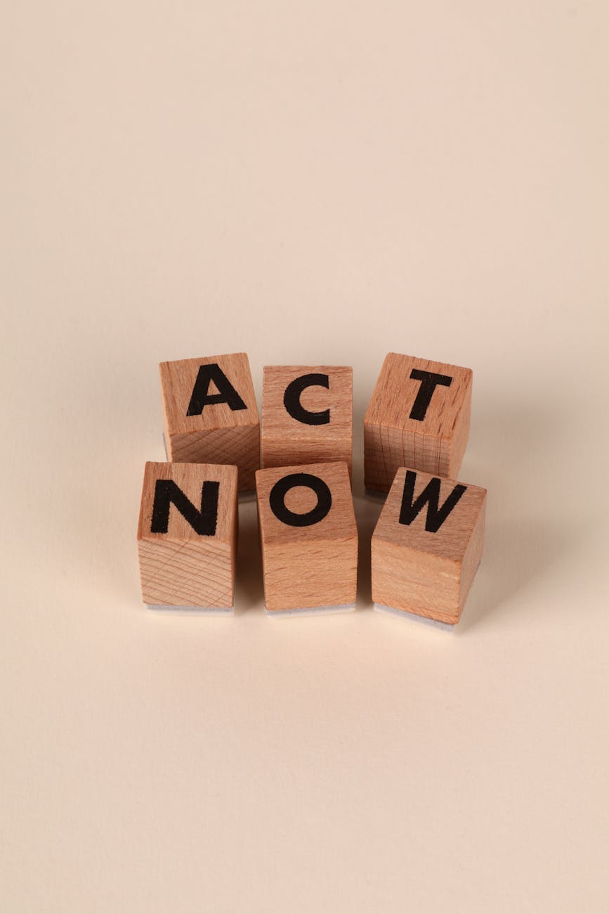 motivational block letters spelling act now