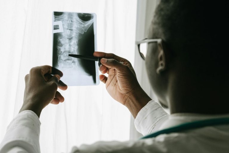 a doctor looking at an x ray