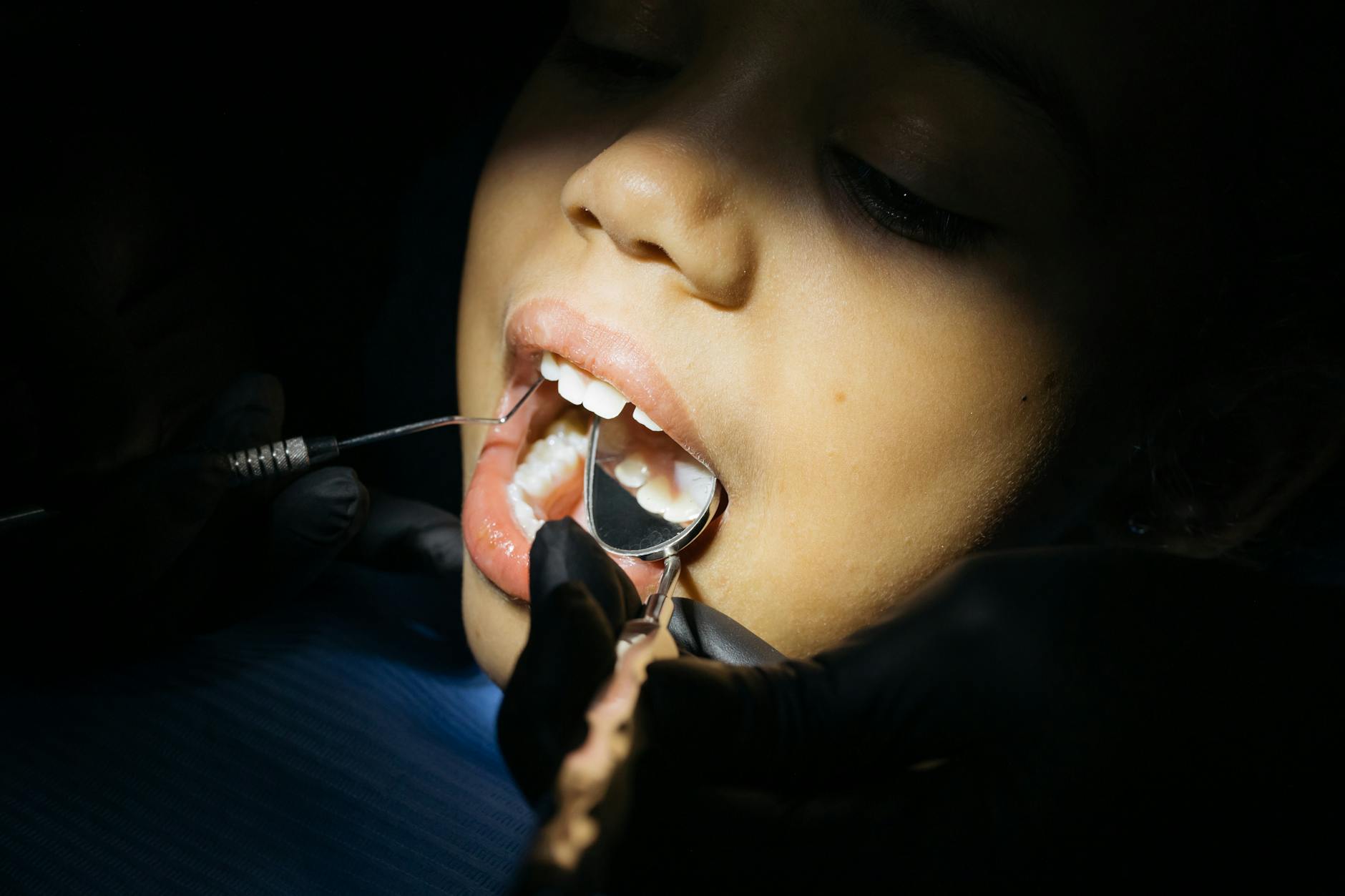 close up shot of a kid having dental checkup